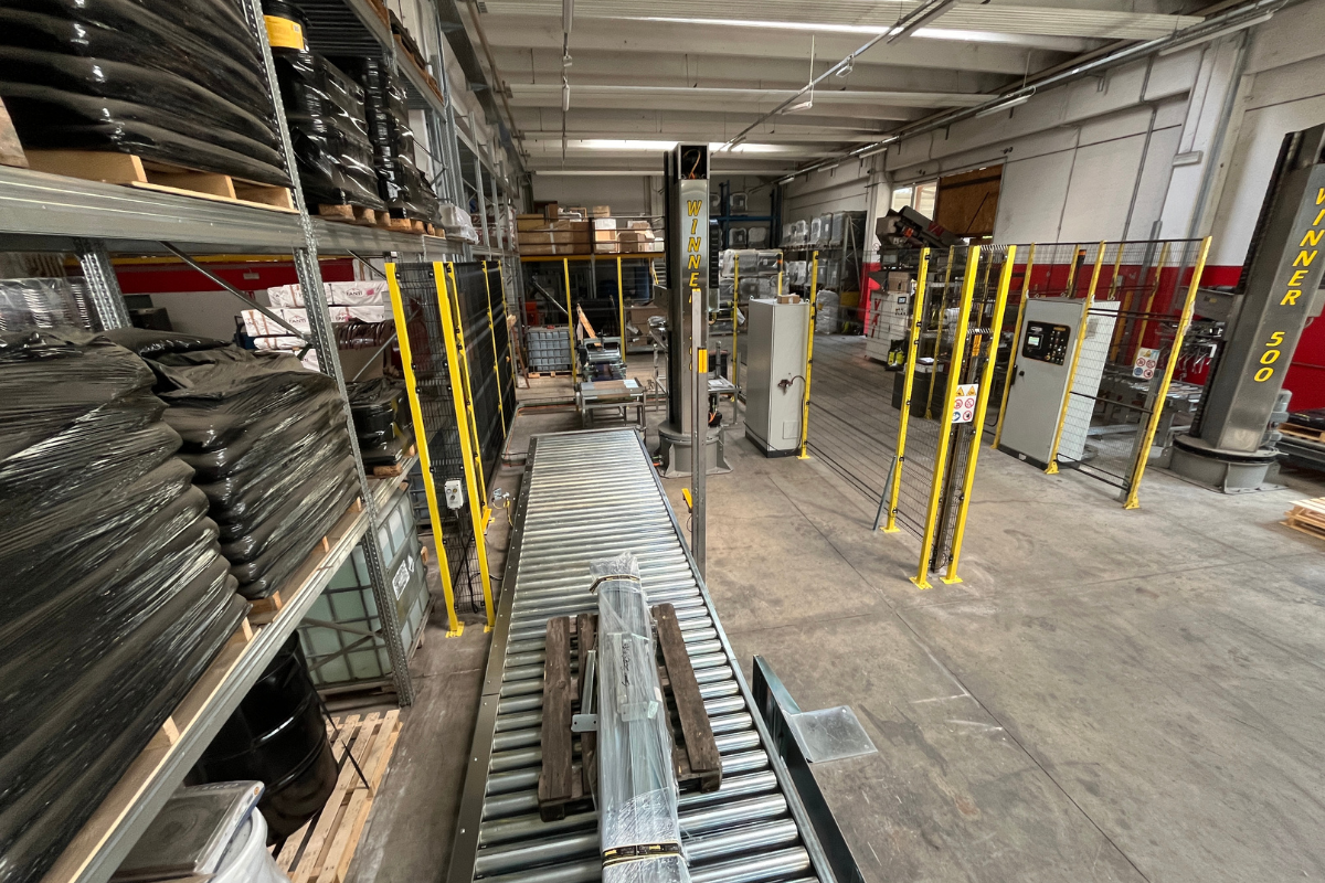 Impianto automatico di pallettizzazione sacchi sottovuoto