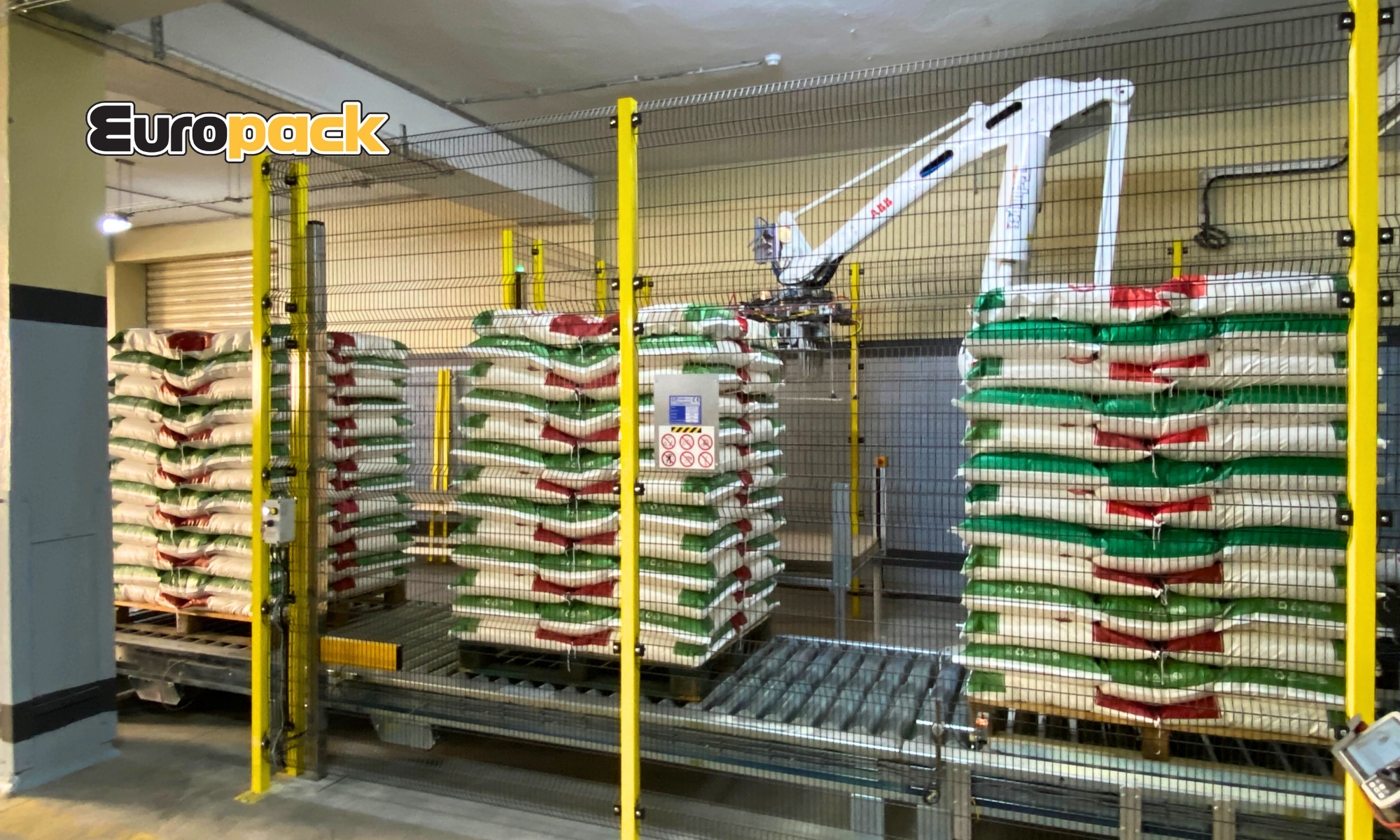 Impianto di pallettizzazione per sacchi a bocca aperta